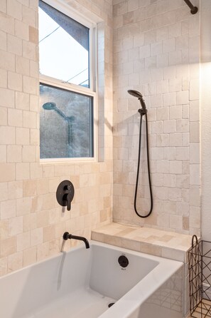 Combined shower/bathtub, towels, soap, shampoo