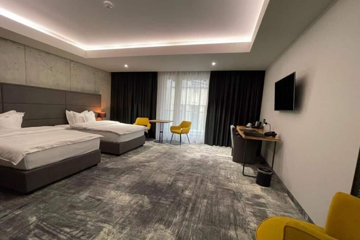 Premium bedding, down comforters, pillowtop beds, minibar