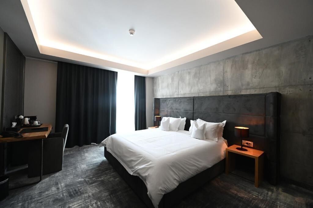 Premium bedding, down comforters, pillowtop beds, minibar