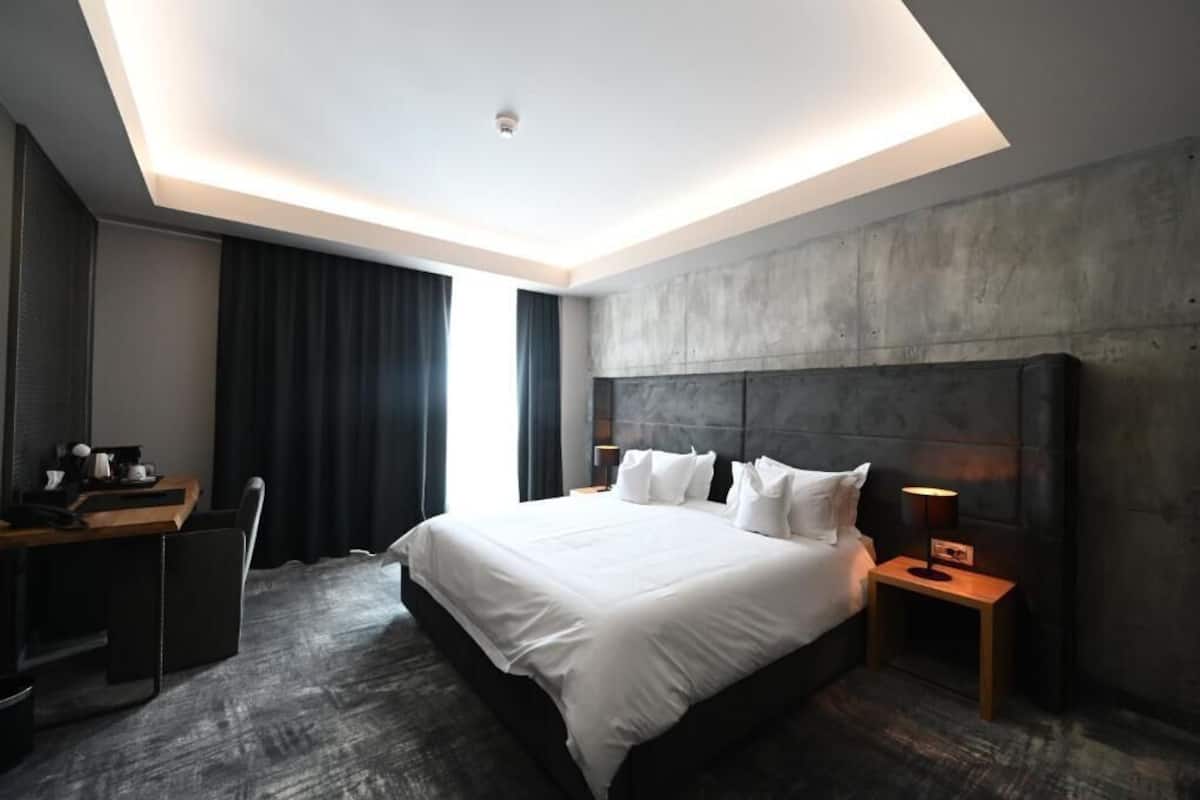Premium bedding, down comforters, pillowtop beds, minibar