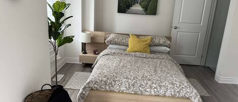 1 bedroom, desk, iron/ironing board, travel crib