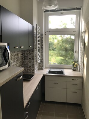 Fridge, microwave, coffee/tea maker, electric kettle