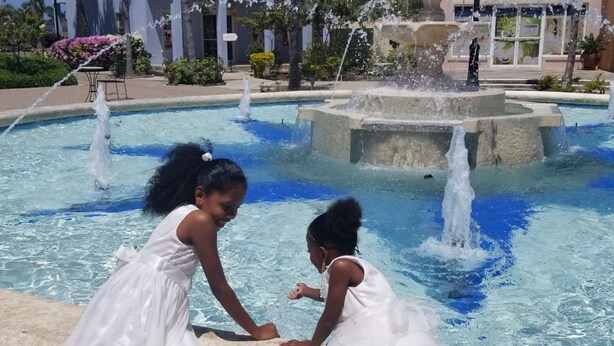 A fountain with water jets in a public square. - Holiday House at Villa Montego (Montego Bay)