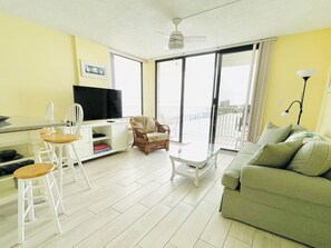 Premier Condo, 1 King Bed with Sofa bed | Living area | 38-inch flat-screen TV with cable channels, TV - Lovers Club Beach Club (Fort Myers Beach)