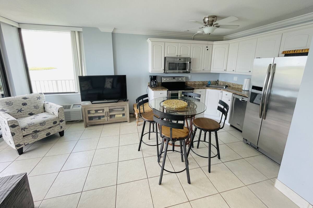 Premier Condo, 1 King Bed with Sofa bed | Living area | 38-inch flat-screen TV with cable channels, TV