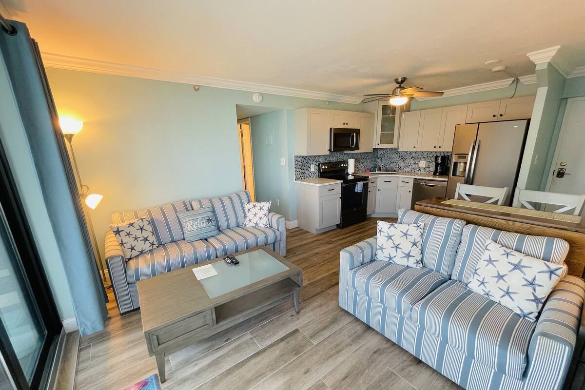 Premier Condo, 1 King Bed with Sofa bed | Living area | 38-inch flat-screen TV with cable channels, TV