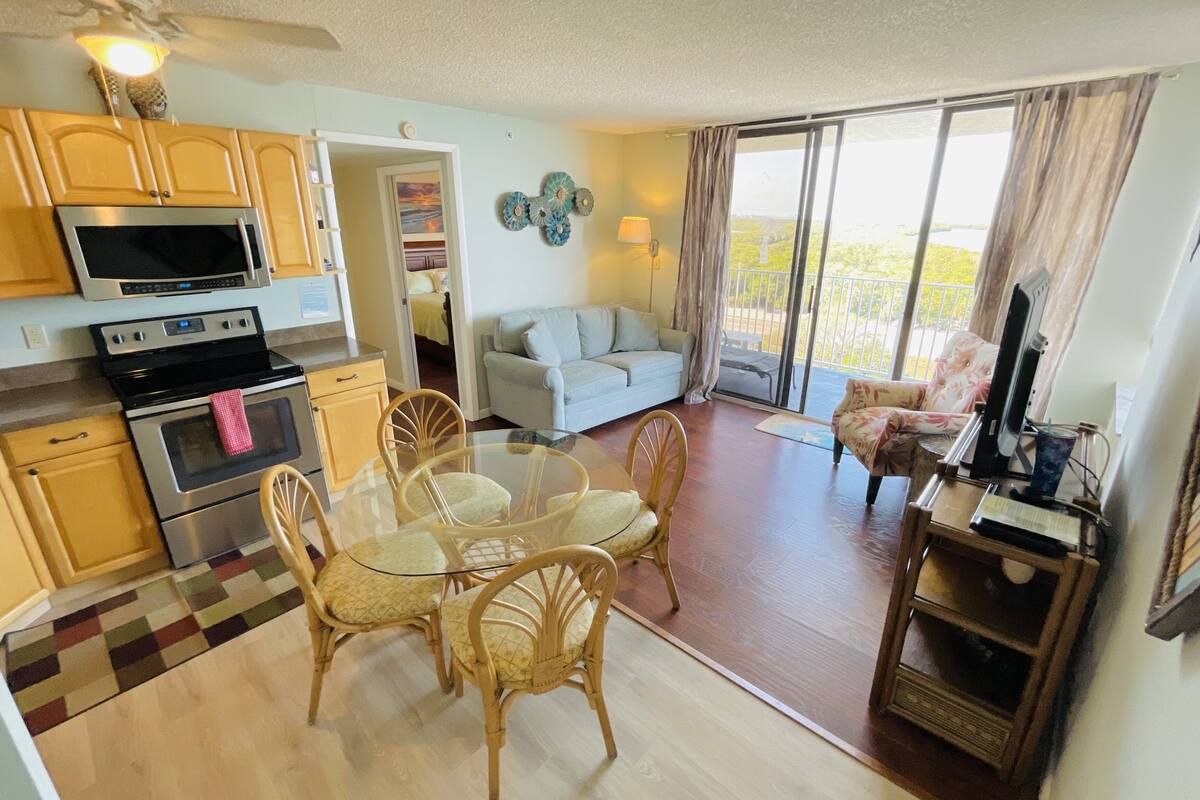 Premier Condo, 1 King Bed with Sofa bed | Living area | 38-inch flat-screen TV with cable channels, TV