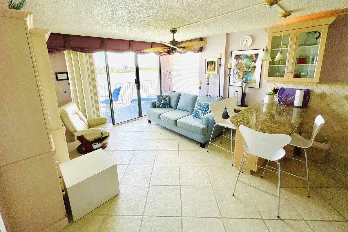 Premier Condo, 1 King Bed with Sofa bed | Living area | 38-inch flat-screen TV with cable channels, TV