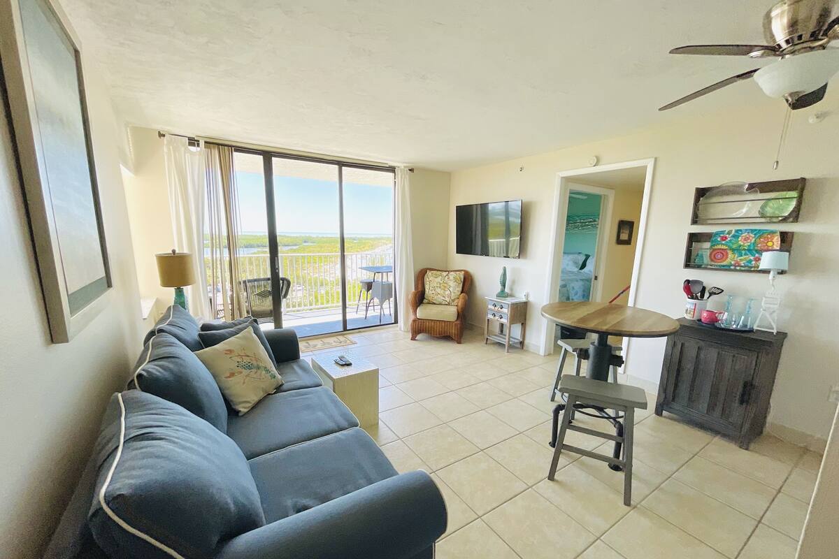 Premier Condo, 1 King Bed with Sofa bed | Living area | 38-inch flat-screen TV with cable channels, TV