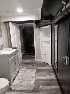 Shower, eco-friendly toiletries, hair dryer, towels