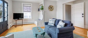 Waterfront, walkable, updated home with harbor views & partial AC