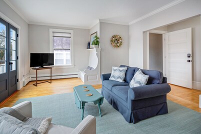 Waterfront, walkable, updated home with harbor views & partial AC