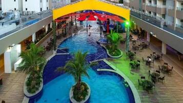 Indoor pool, 9 outdoor pools, open 9:00 AM to 10:00 PM, pool umbrellas