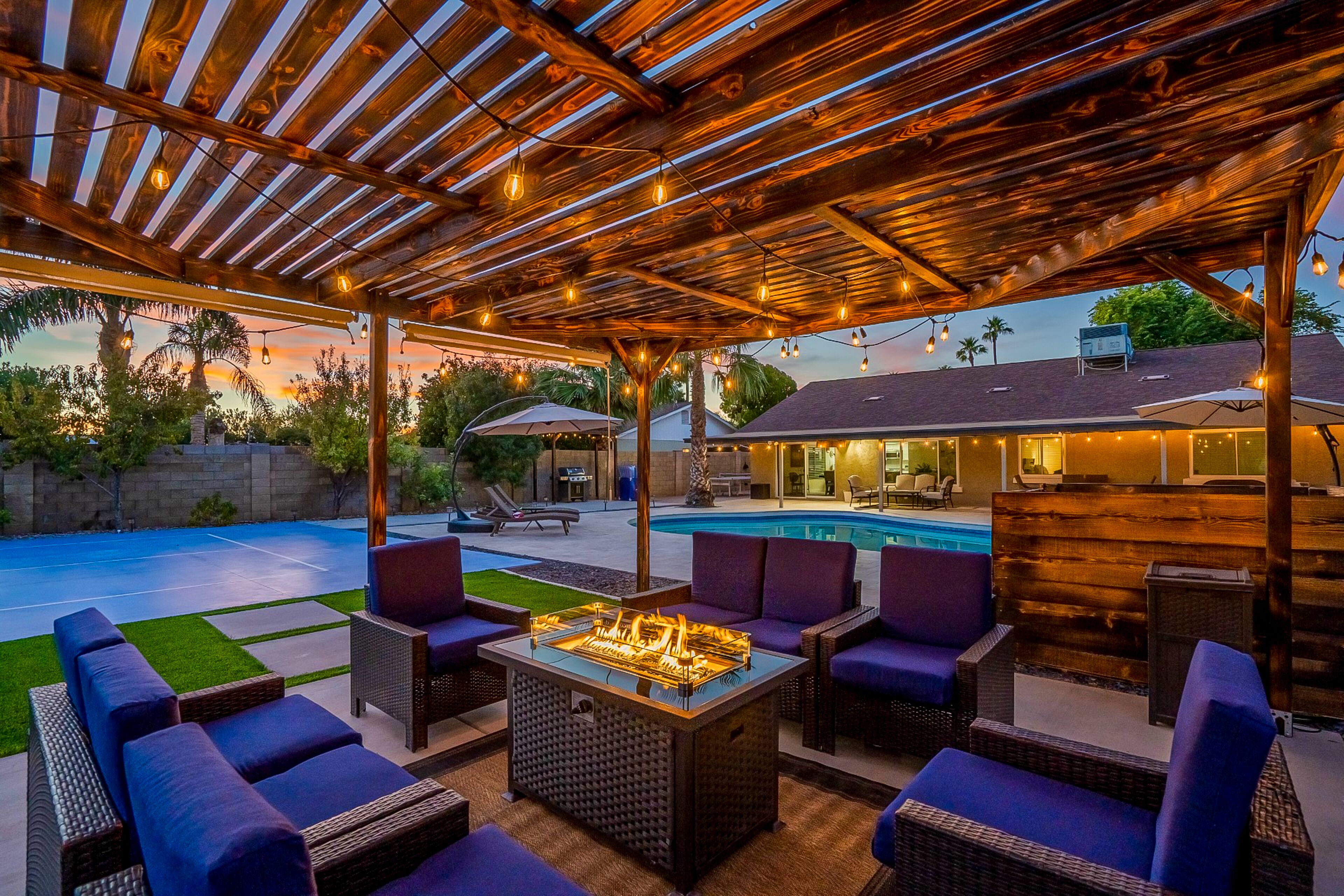 Exciting home with pool, hot tub, putting green, pickleball, & basketball