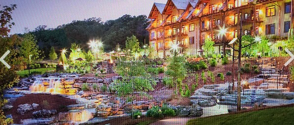 Situated on a hillside, this traditional hotel offers a serene garden with a water feature and lush greenery.