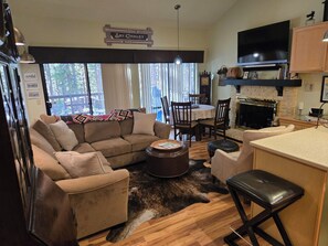 Smart TV, fireplace, books