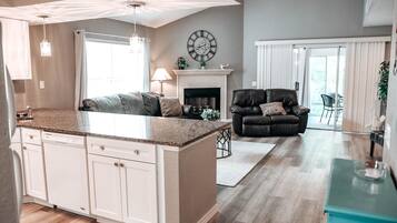 Smart TV, fireplace, books