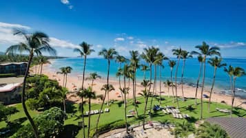 On the beach, sun loungers, beach towels