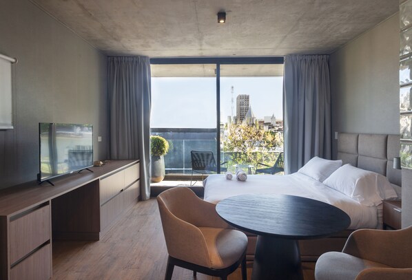 Premium bedding, down comforters, pillowtop beds, in-room safe