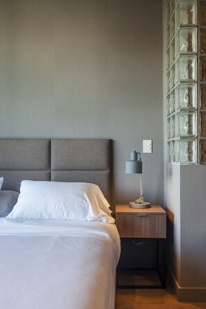 Luxe beddengoed, donzen dekbedden, pillowtop-bedden, een minibar