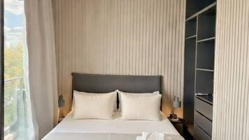 Studio Suite (5) | Seprai premium, selimut bulu angsa, bantalan ekstra lembut, dan minibar