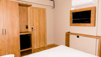 Minibar, wifi gratis y ropa de cama