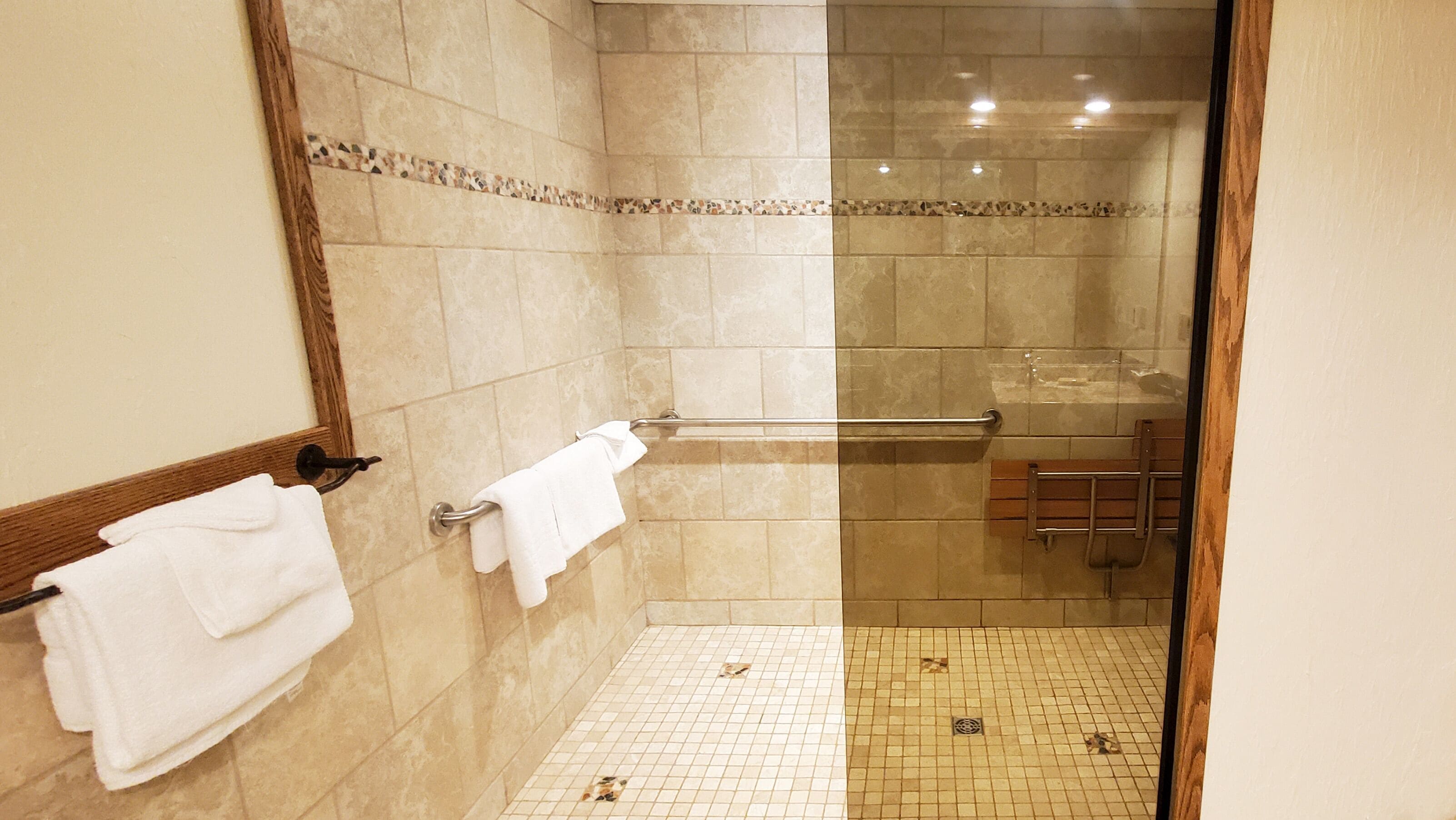 mountain view suite accessible | bathroom | hair dryer, towels, soap, shampoo