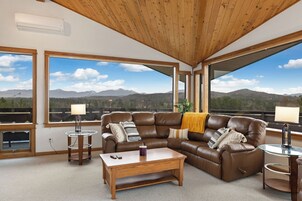 Olympic Suite | Living area | 55-inch TV with cable channels