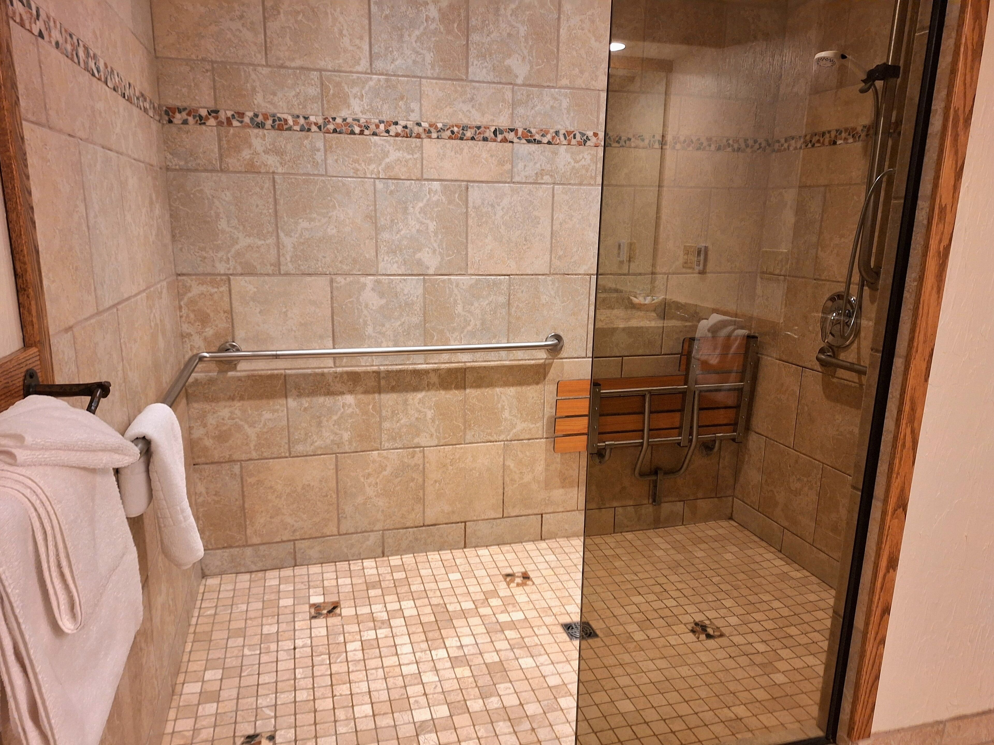 mountain view suite accessible | bathroom | hair dryer, towels, soap, shampoo