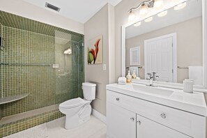 Combined shower/bathtub, hair dryer, towels, soap