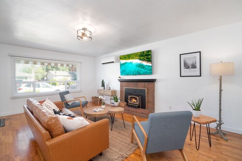 Modern Mid-Century Retreat with Stylish Amenities & Family-Friendly Comfort