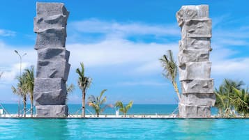 2 outdoor pools, pool umbrellas, pool loungers