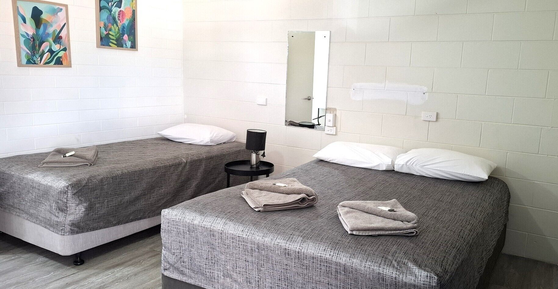 Desk, laptop workspace, blackout curtains, iron/ironing board