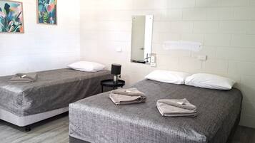 Desk, laptop workspace, blackout curtains, iron/ironing board