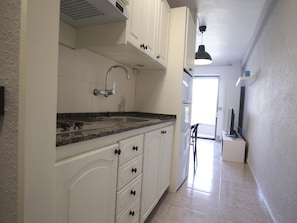 Microwave, stovetop, coffee/tea maker, toaster
