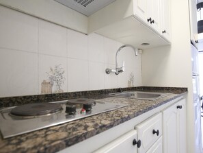 Microwave, stovetop, coffee/tea maker, toaster
