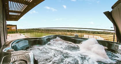 Three bed lodge with two king-size beds and one twin (king by arrangement).