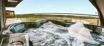 Three bed lodge with two king-size beds and one twin (king by arrangement).