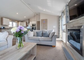Living area - Brand new for 2021. Outstanding, spacious lodge with one double and two twin. (Skegness)
