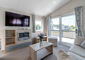 Living area - Brand new for 2021. Outstanding, spacious lodge with one double and two twin. (Skegness)