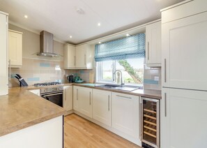 Fridge, oven, stovetop, toaster - Luxury modern 2 Bedroom Lodge. (Swinethorpe, Nr Lincoln)