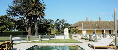 Outdoor pool, pool umbrellas, sun loungers