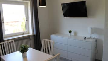 Apartamento standard | Opções para refeição no quarto