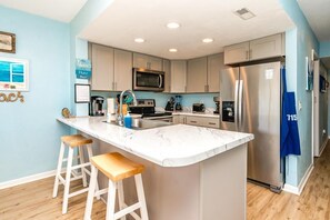 Fridge, microwave, oven, stovetop - 715 Surf - Gorgeous 1BR Surf Condo with Washer and Dryer (Surf City)