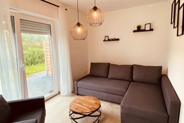 Comfort Townhome | Living area | 40-inch flat-screen TV with satellite channels, TV
