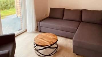 Comfort Townhome | Living room | 40-inch flat-screen TV with satellite channels, TV