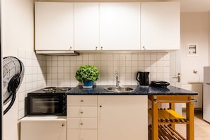 Fridge, microwave, coffee/tea maker, toaster