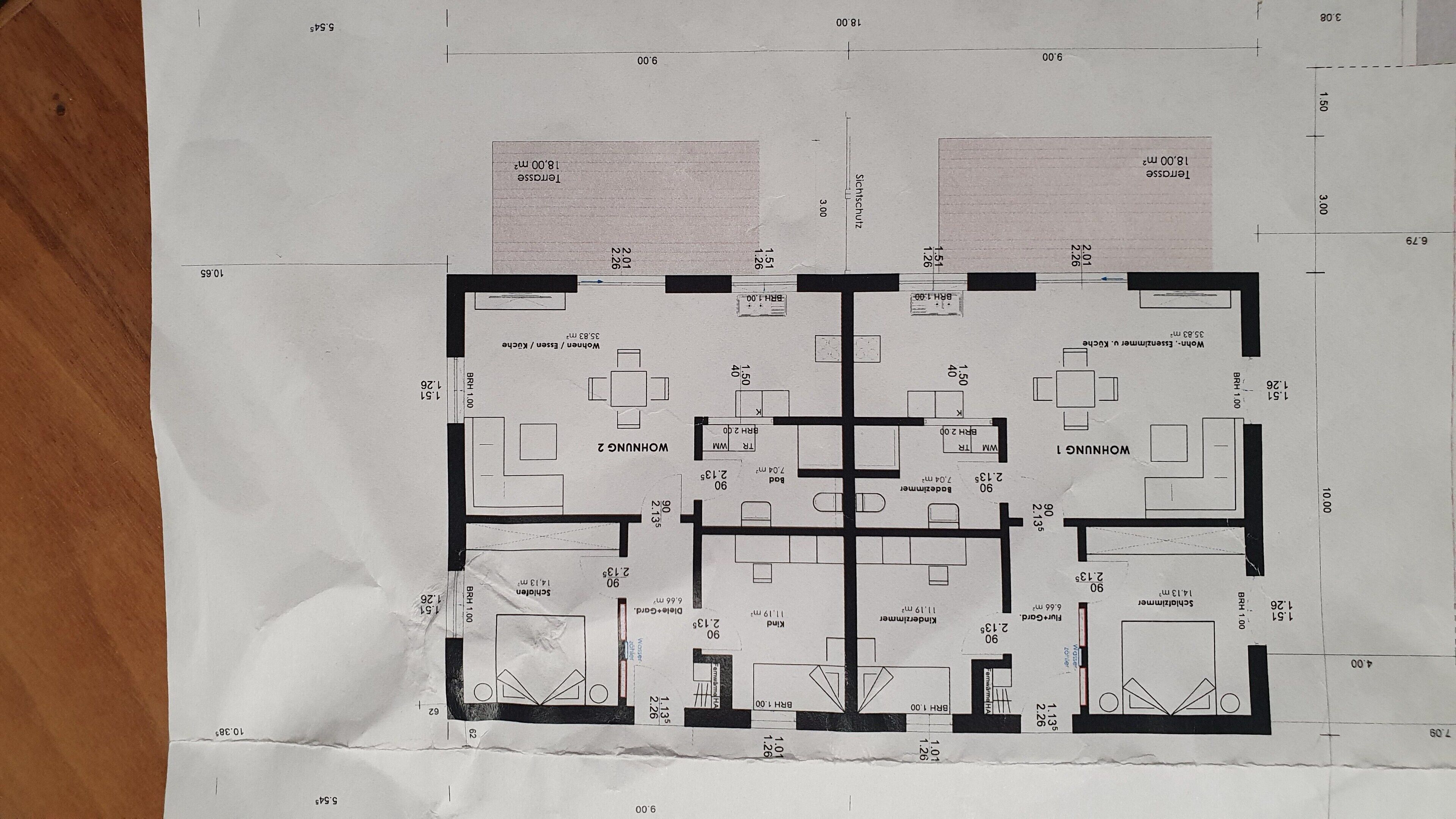 A floor plan of a hotel with multiple rooms, including a kitchen, dining area, and a living room.