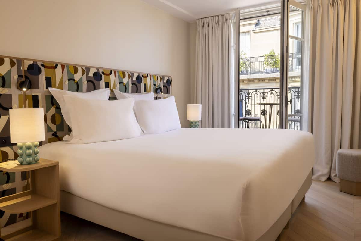 Junior Suite, Balcony | 2 bedrooms, free minibar items, in-room safe, desk