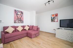 Apartment, Mehrere Betten | Wohnzimmer